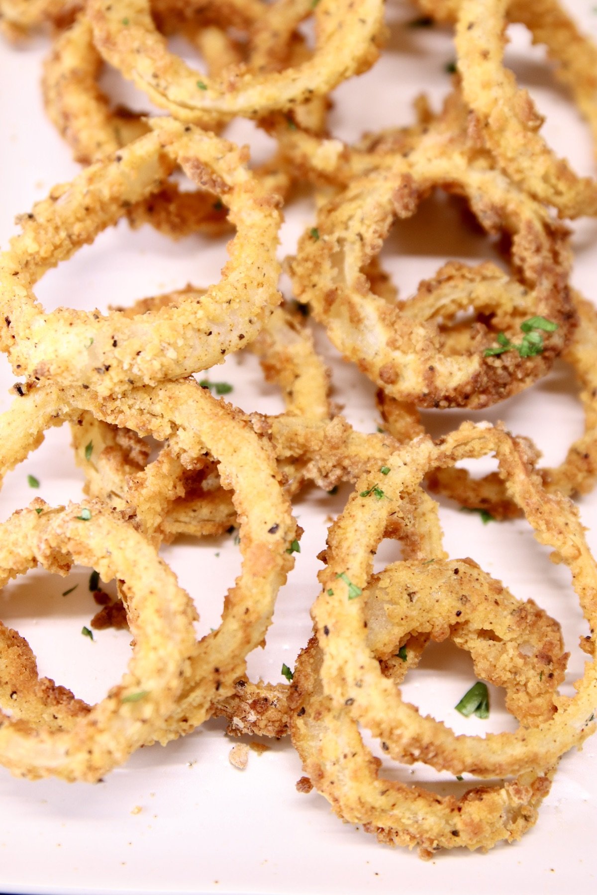 closeup of onion rings on a platter