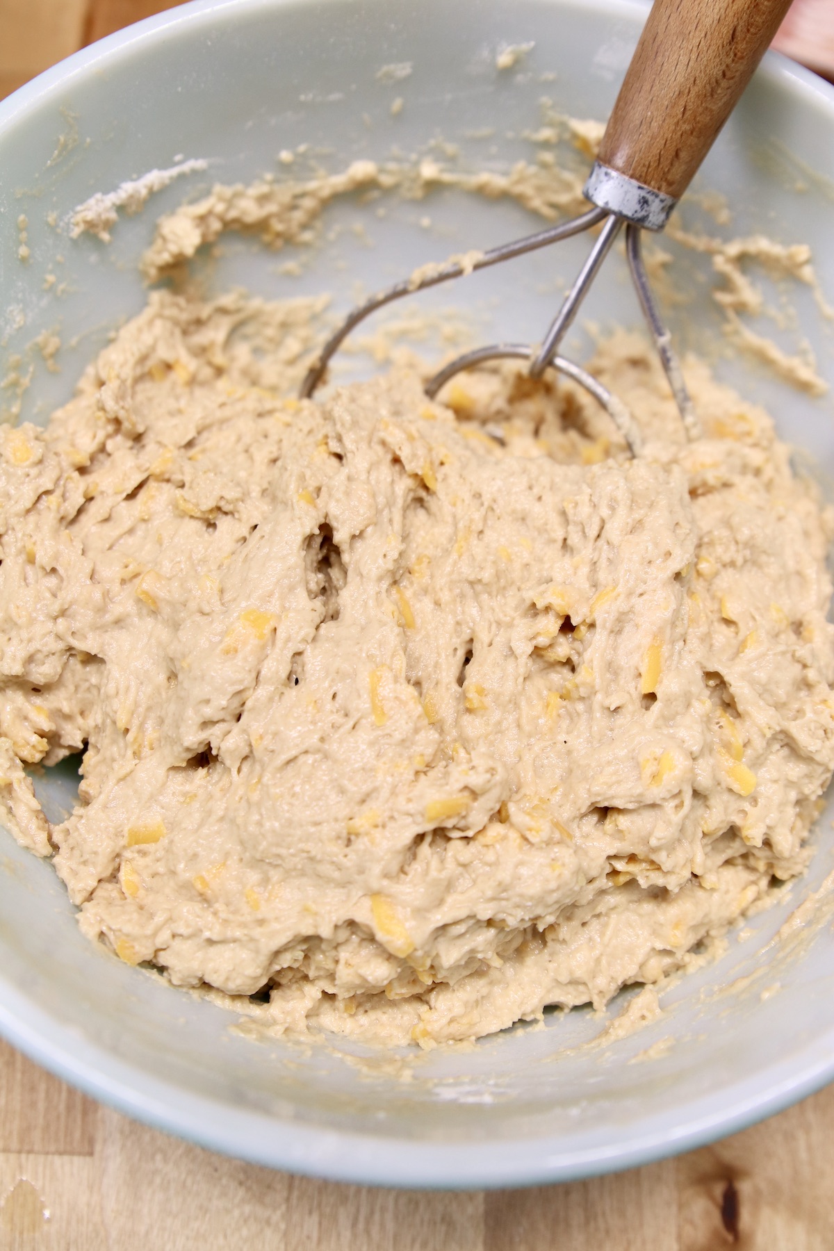 beer bread batter with a dough whisk in a bowl