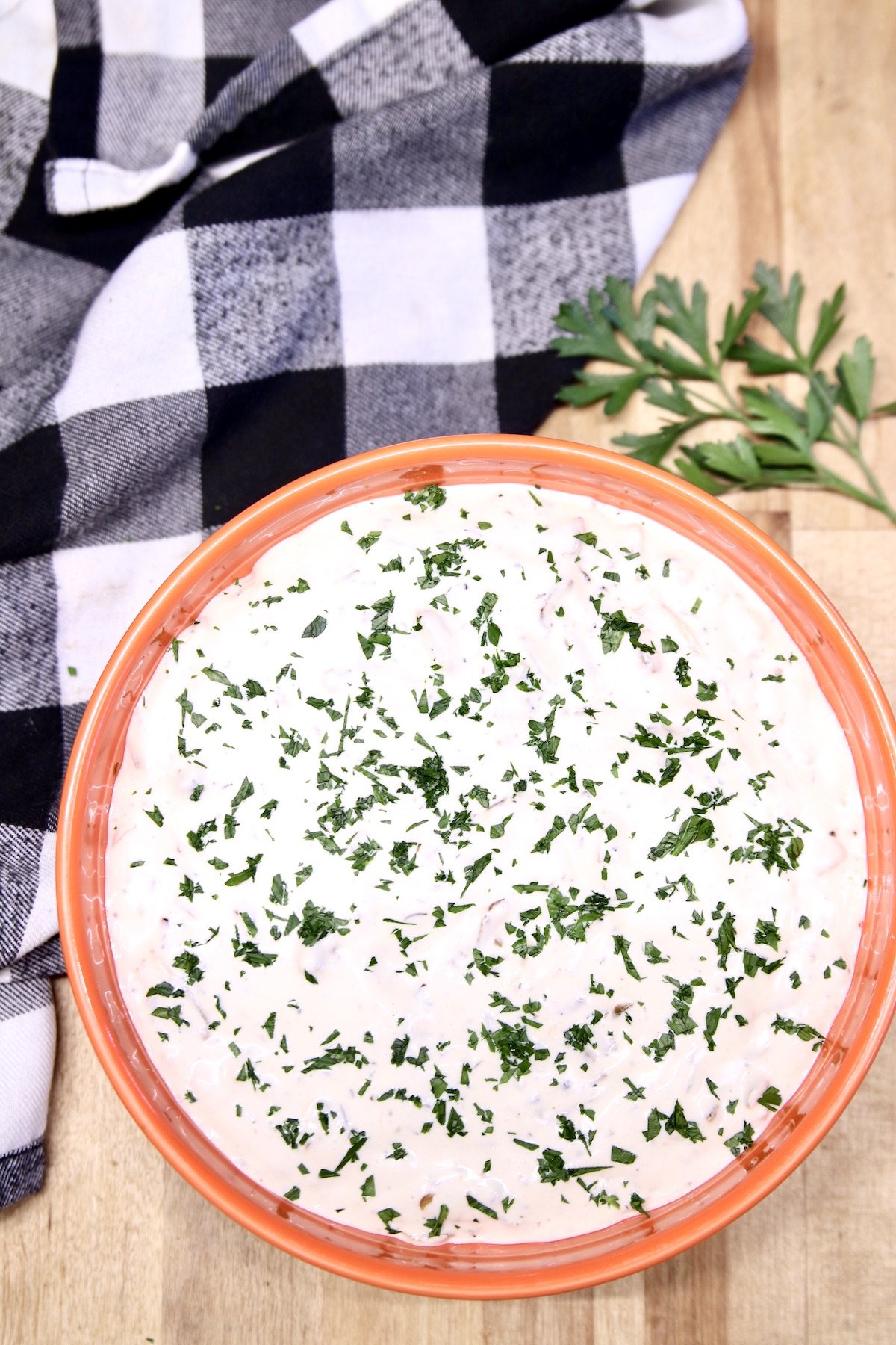 bowl of onion dip with parsley