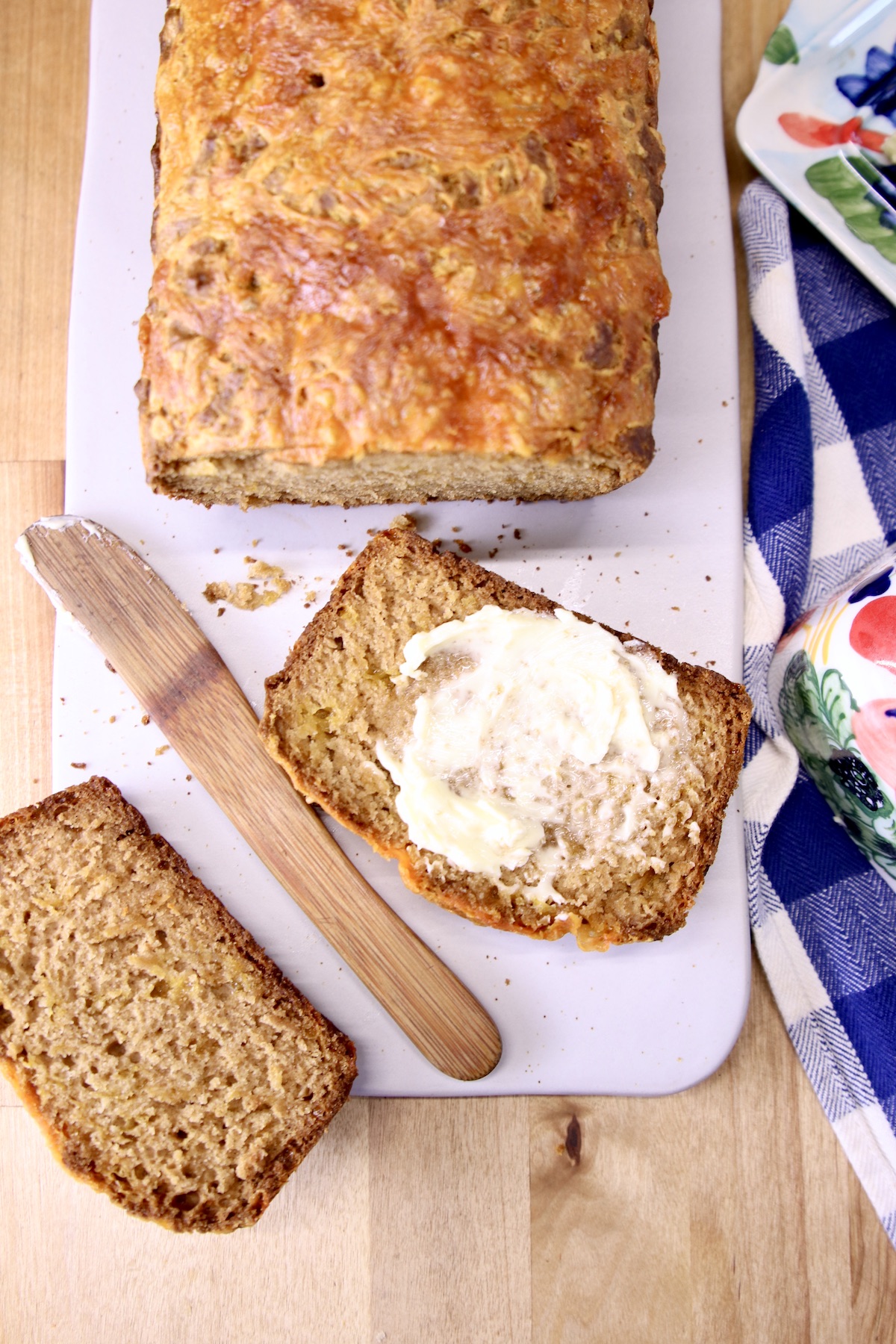 Cheddar Beer Bread - sliced with butter