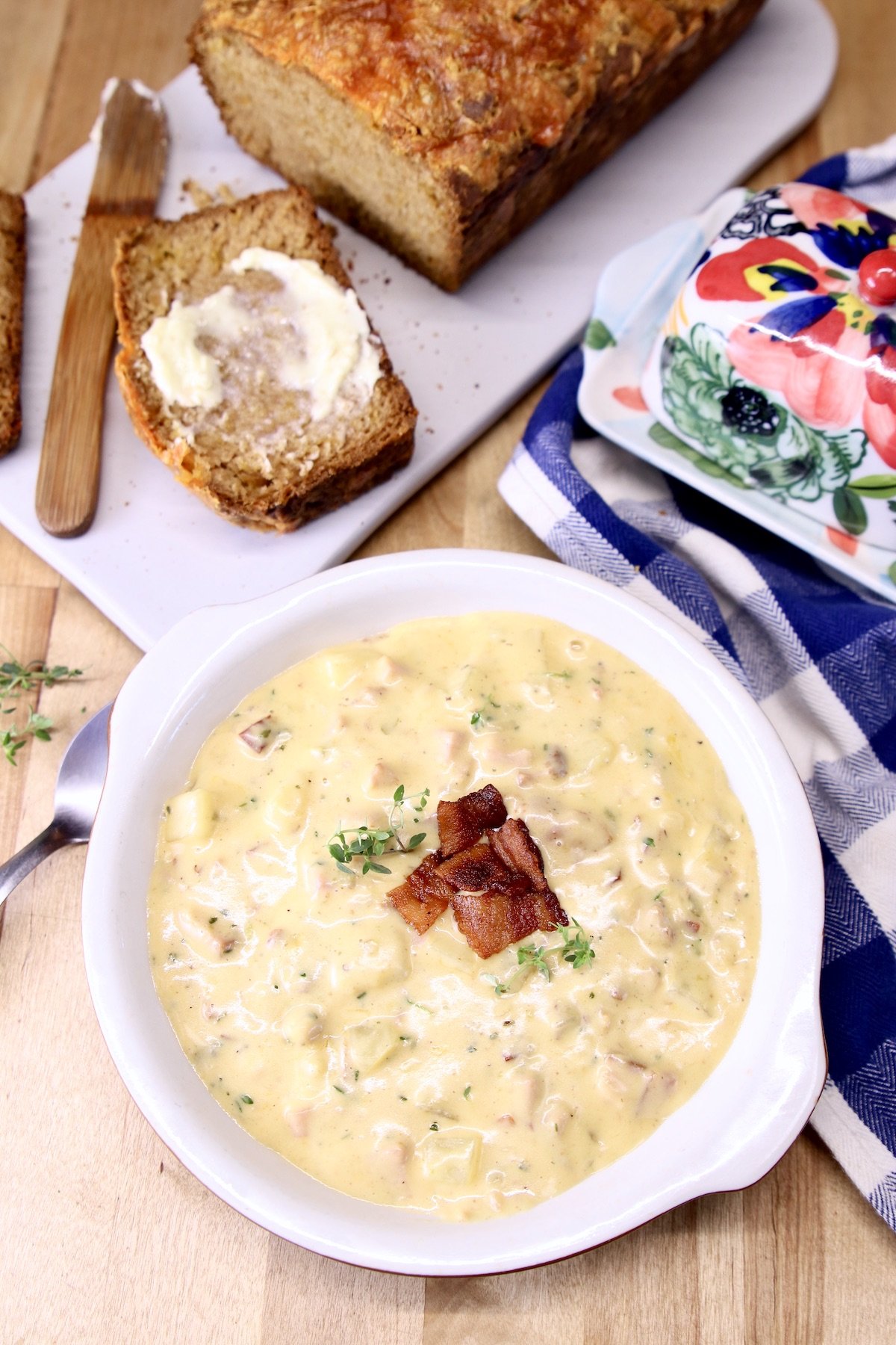 ham and cheese soup with loaf of bread