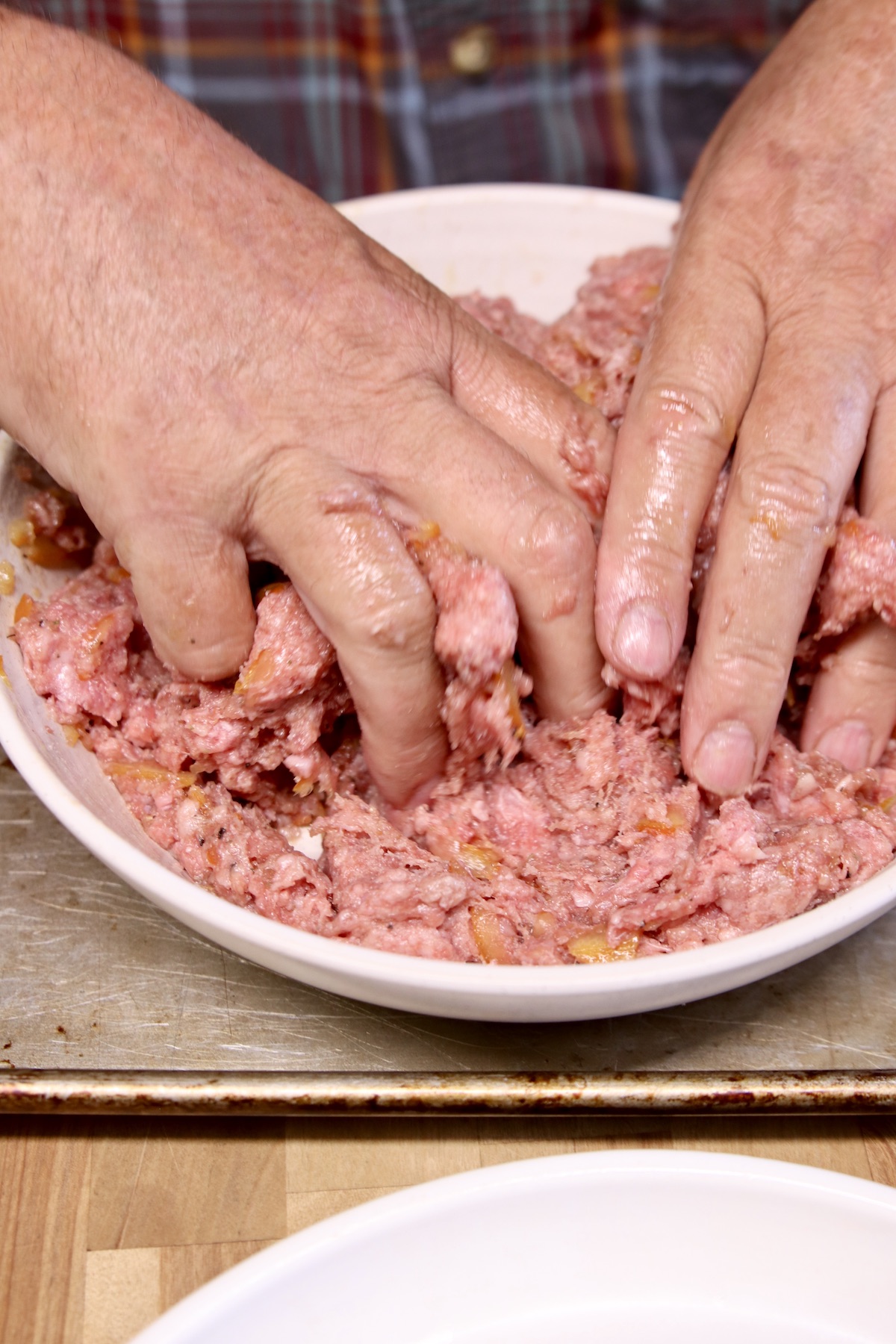 mixing ground beef for meatballs