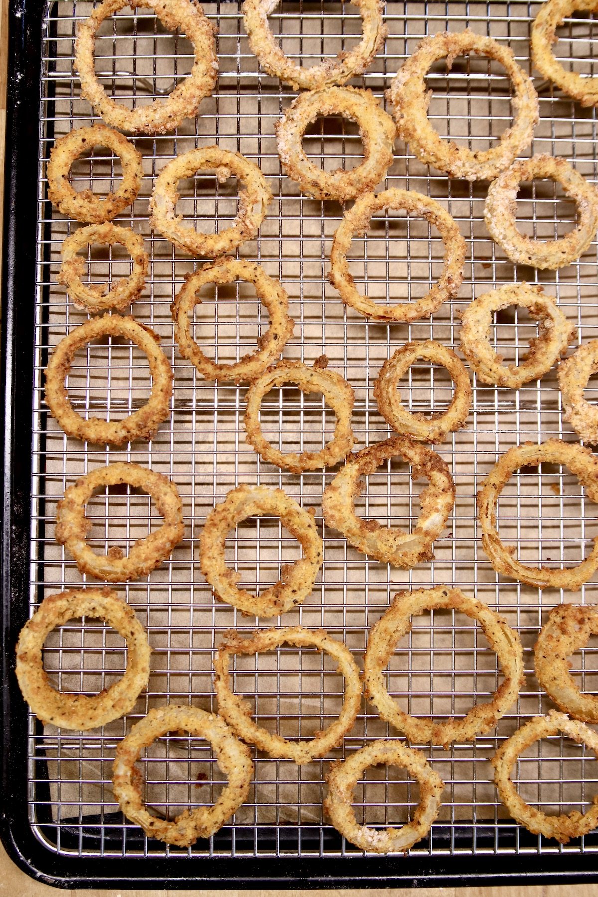 wire rack with crispy onion rings