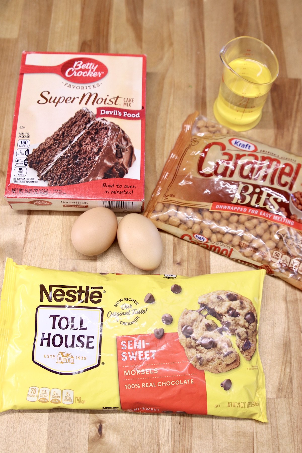 ingredients for cake mix cookies with chocolate chips and caramel bits