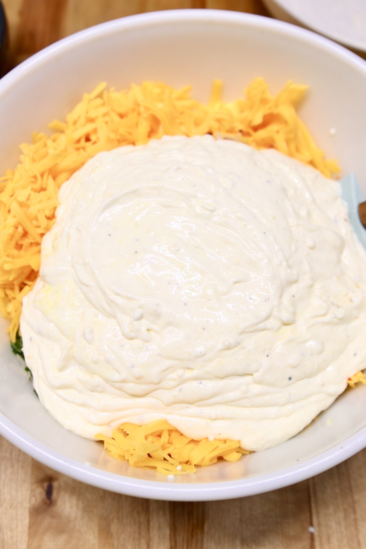 cheese and cream sauce in a bowl for hashbrown casserole