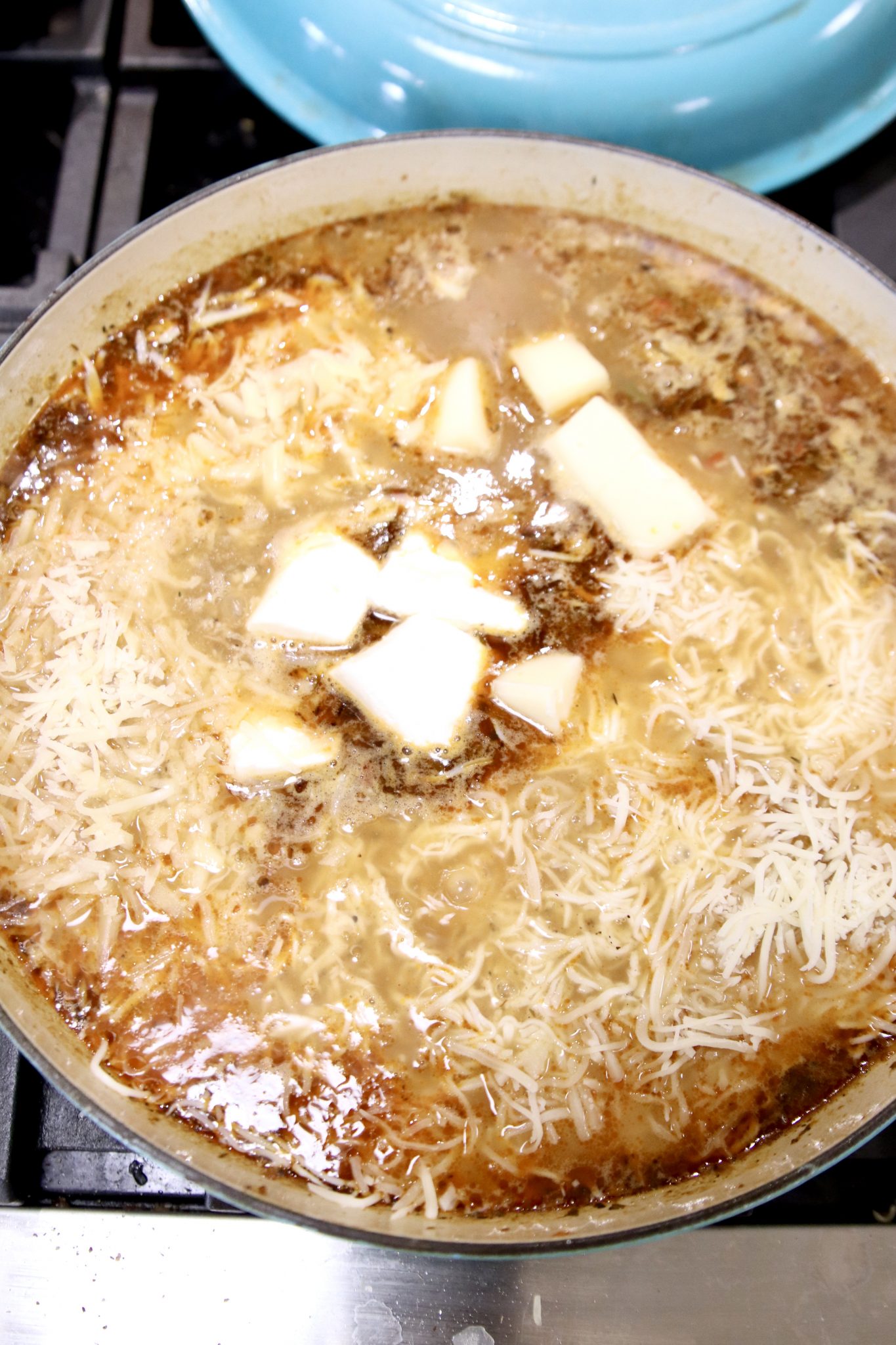 adding 5 kinds of cheese to broth 