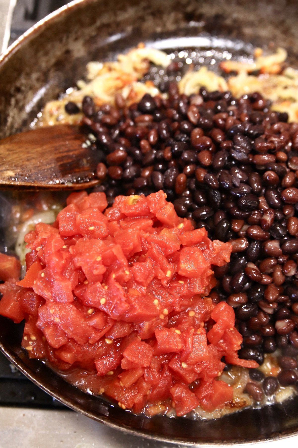 black beans and diced tomatoes in a skillet