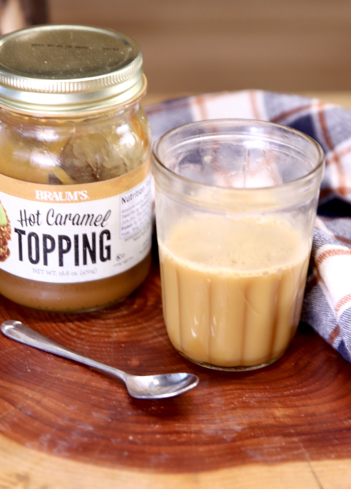 caramel syrup with jar of caramel ice cream topping