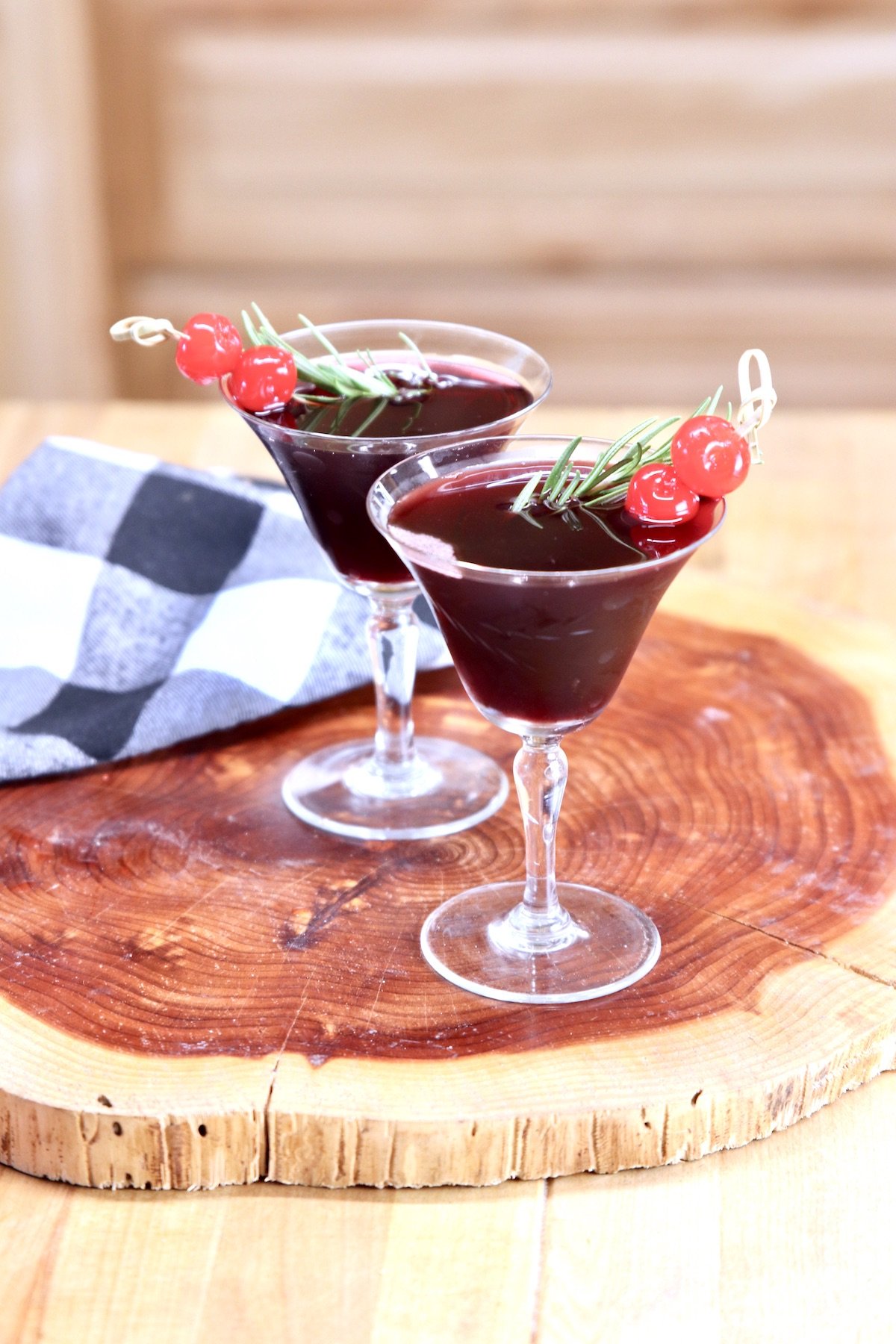 Amaretto Wine Cocktail in 2 glasses on a wood board