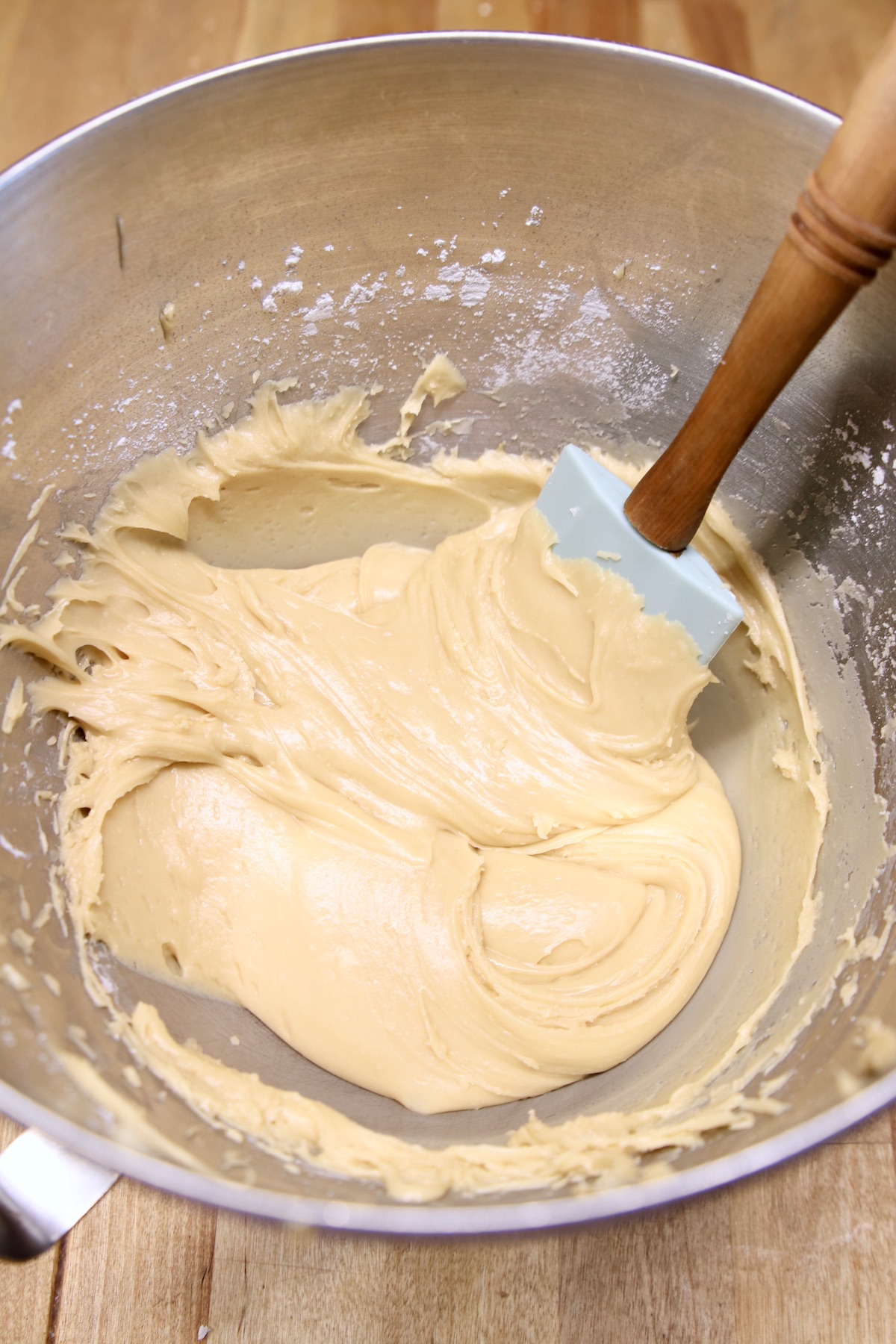 brown sugar icing in a bowl with a spatula
