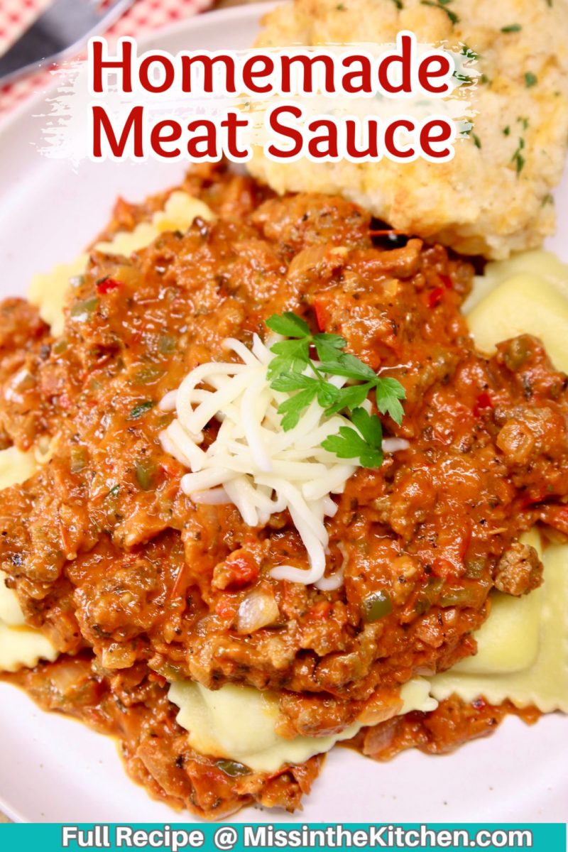 homemade meat sauce over ravioli - text overlay