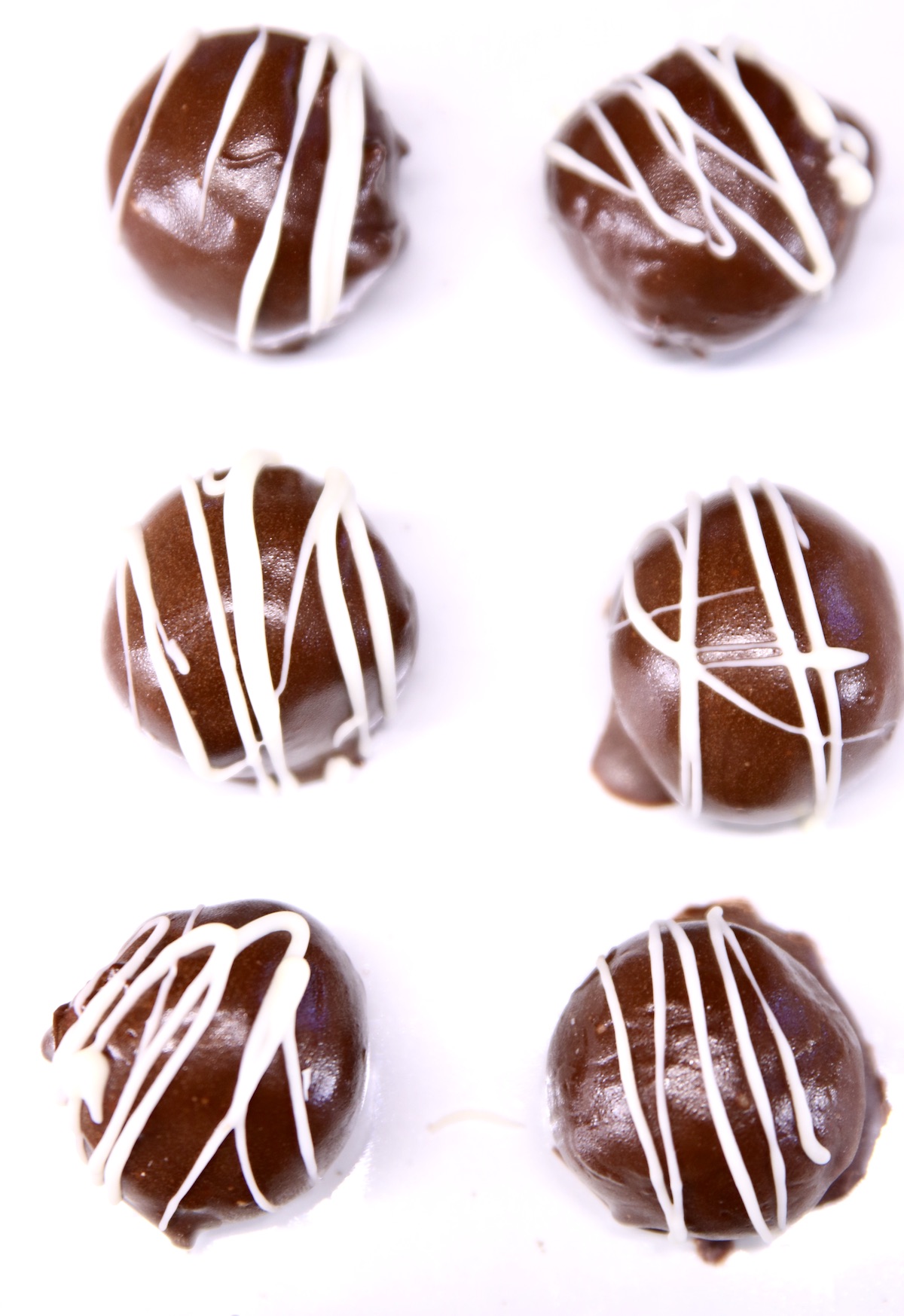 Peanut Butter balls on a white tray - overhead