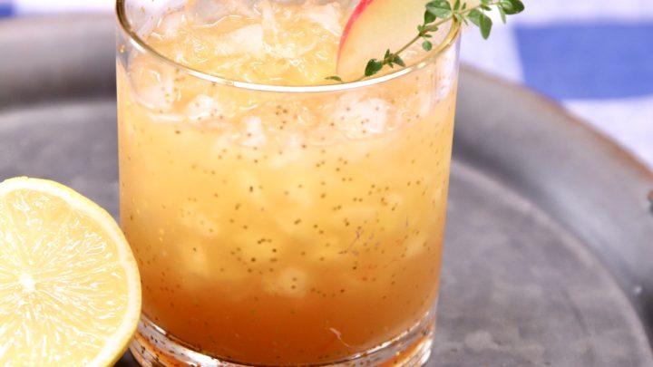 Apple Amaretto Sour Cocktail with apple slice garnish