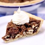slice of pecan pie with cool whip