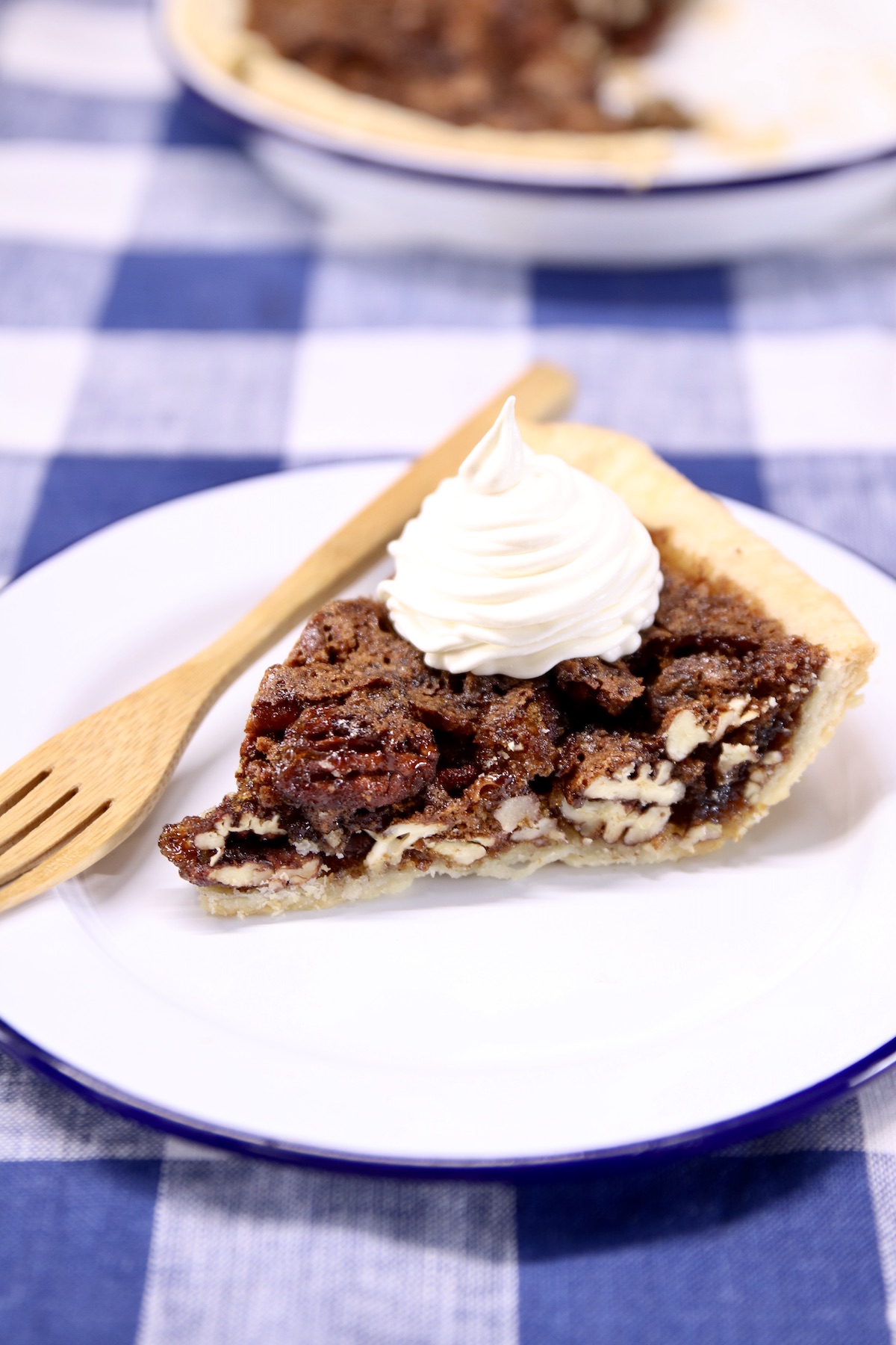 slice of pecan pie on a white plate