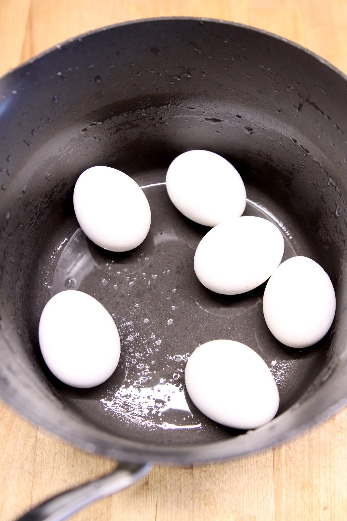hard boiled eggs in a pan
