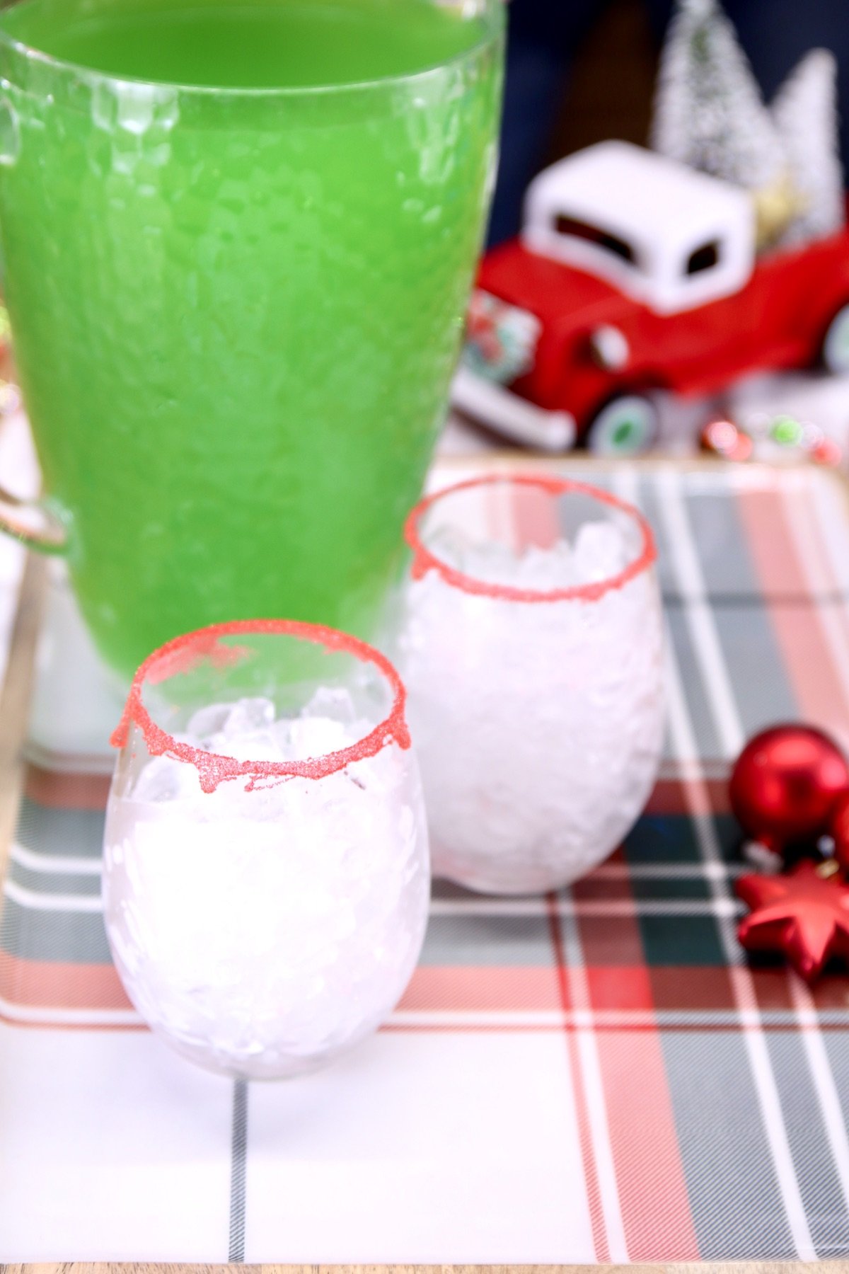 grinch punch with red rimmed glasses