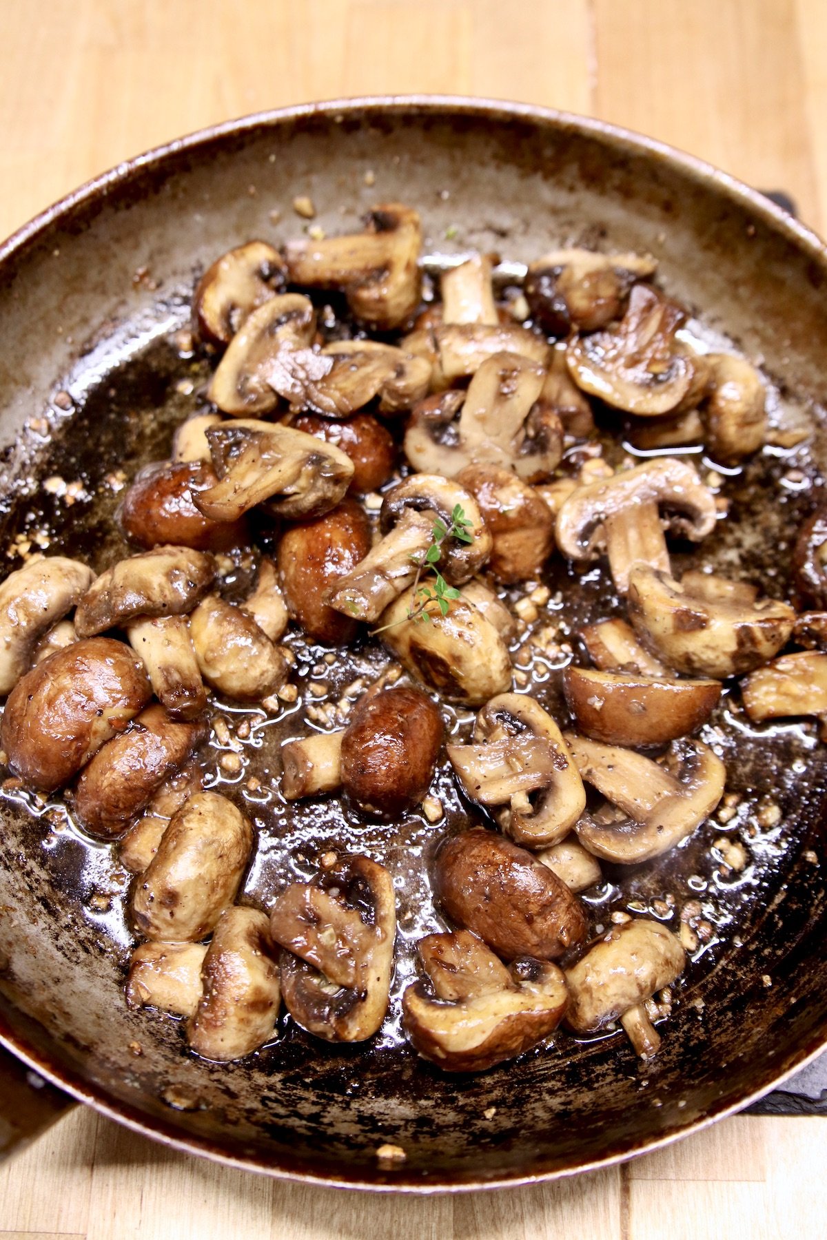 garlic butter mushrooms in a skillet