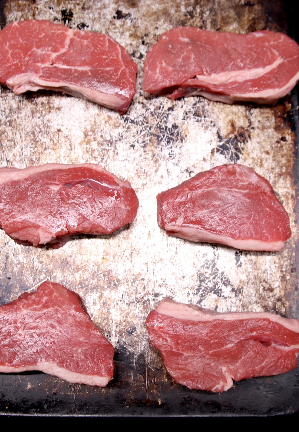 6 tri-tip steaks on a sheet pan