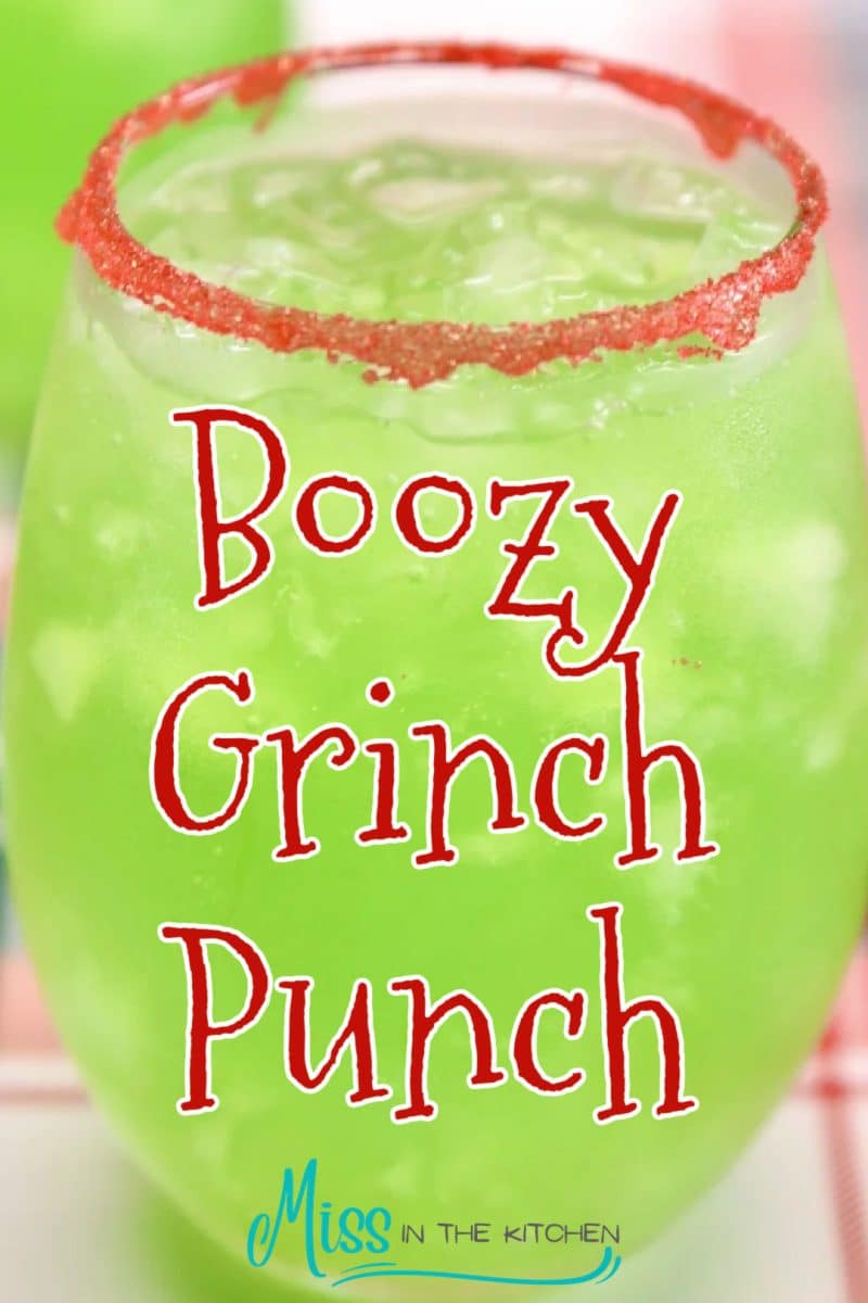 Closeup of glass of green punch - text overlay.