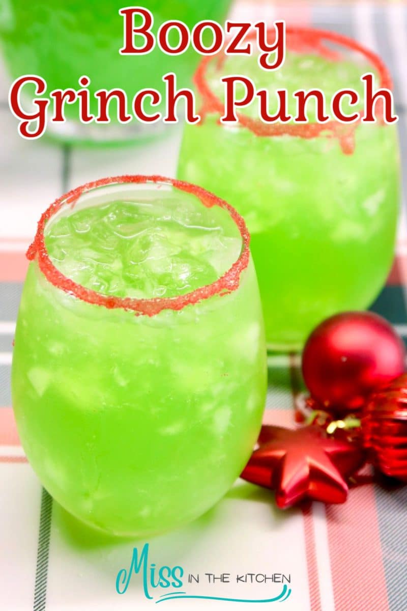 Grinch punch in 2 glasses with red sugar rim. Text overlay.