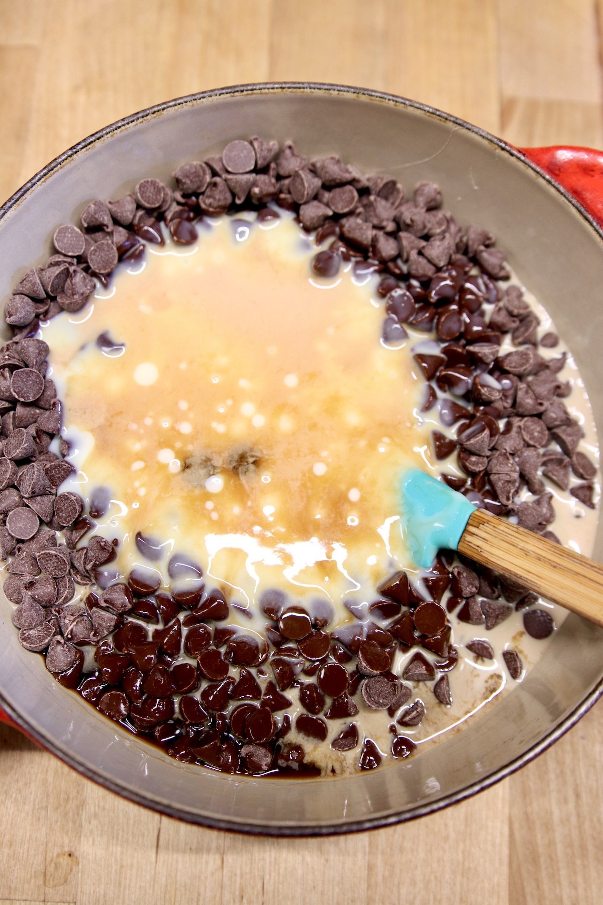 chocolate chips, sweetened condensed milk in a pan for fudge