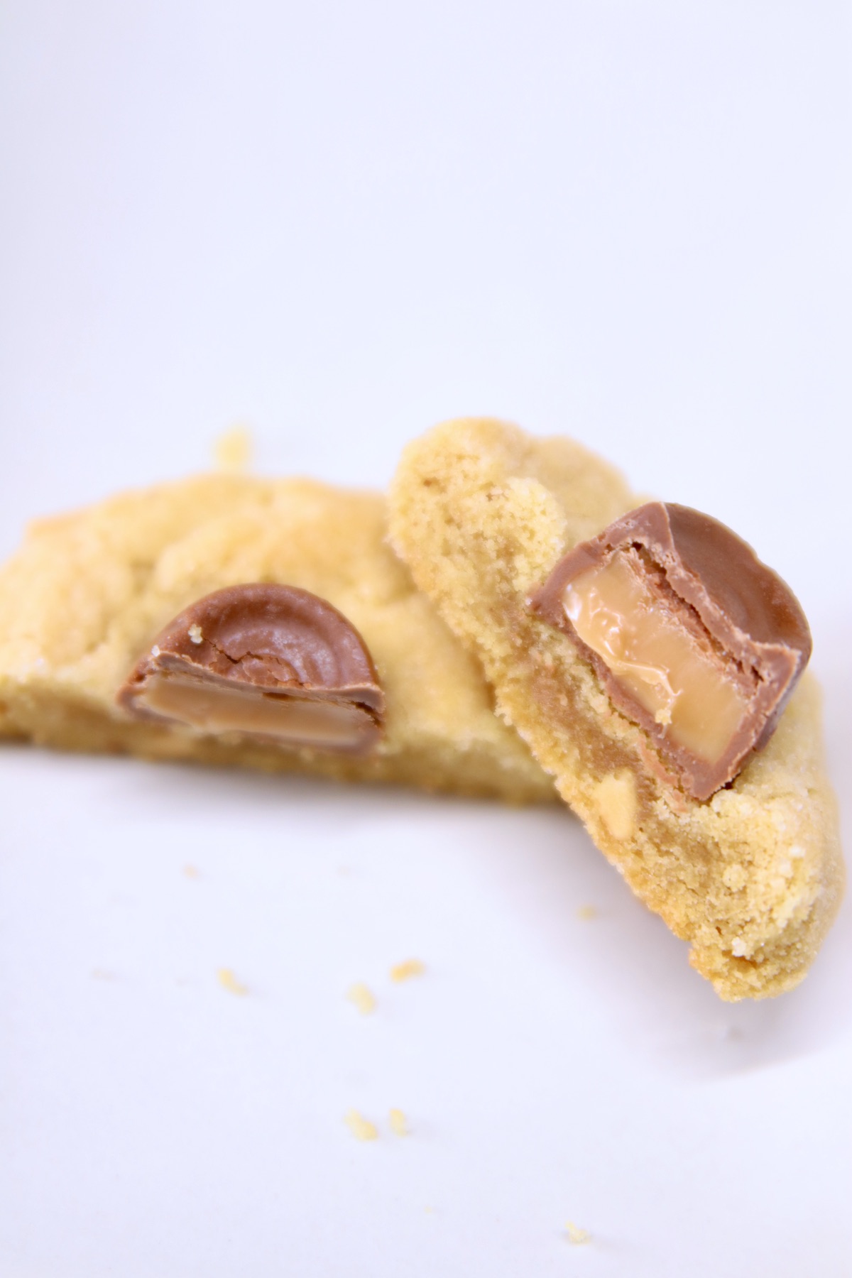 close up of peanut butter caramel cookie - cut in half