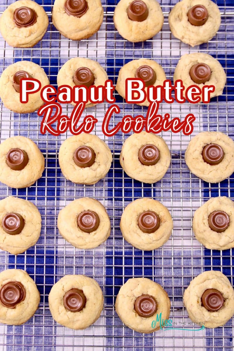 Peanut butter rolo cookies on a wire rack - text overlay.