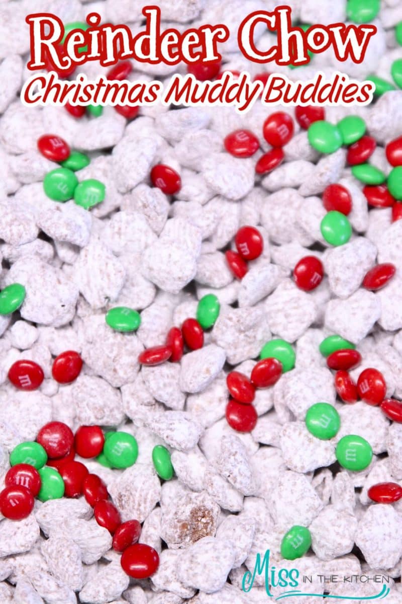 Sheet pan filled with muddy buddies and holiday M&Ms. Text overlay.