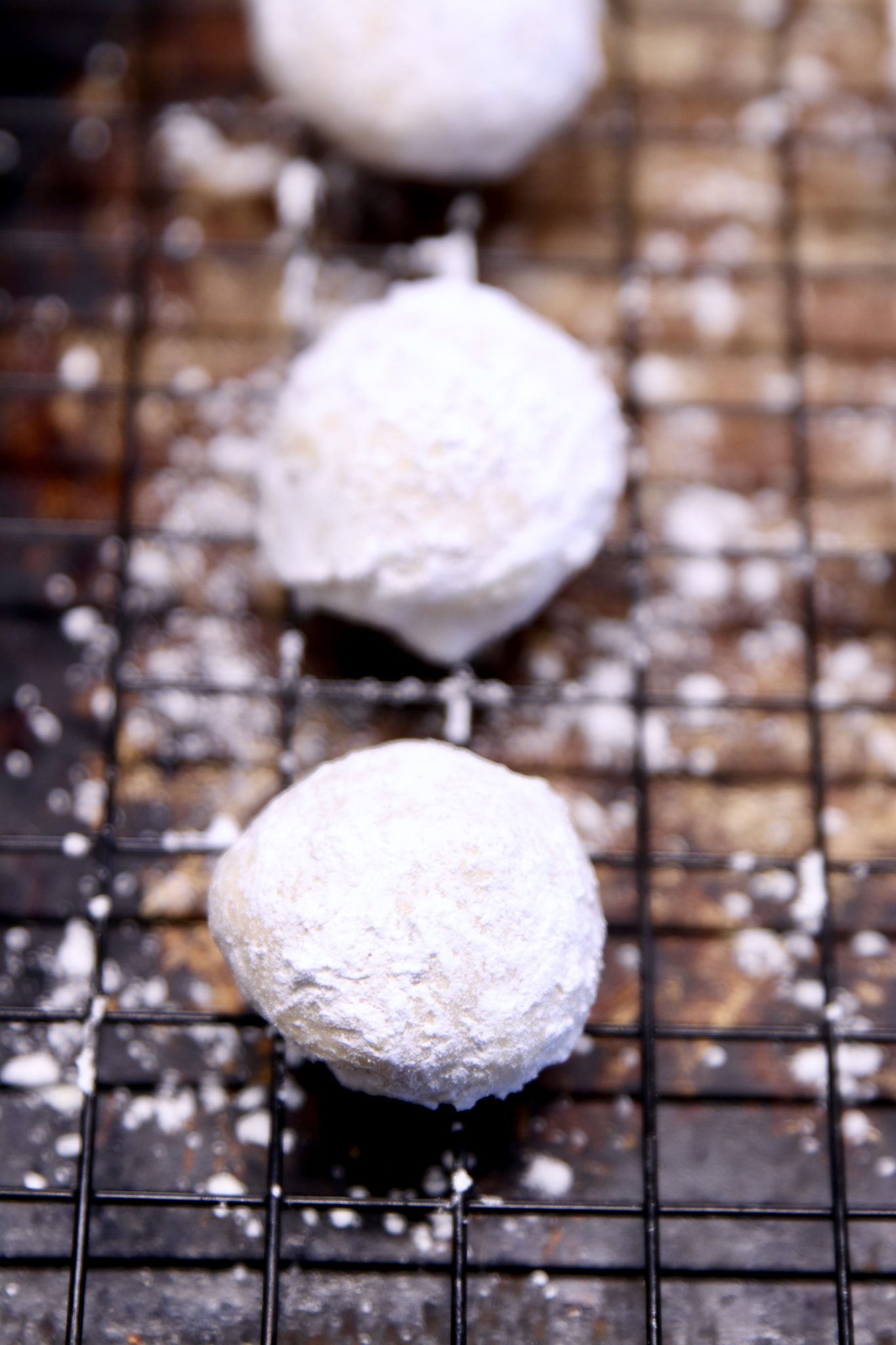 snowball cookies - close up on a wire rack