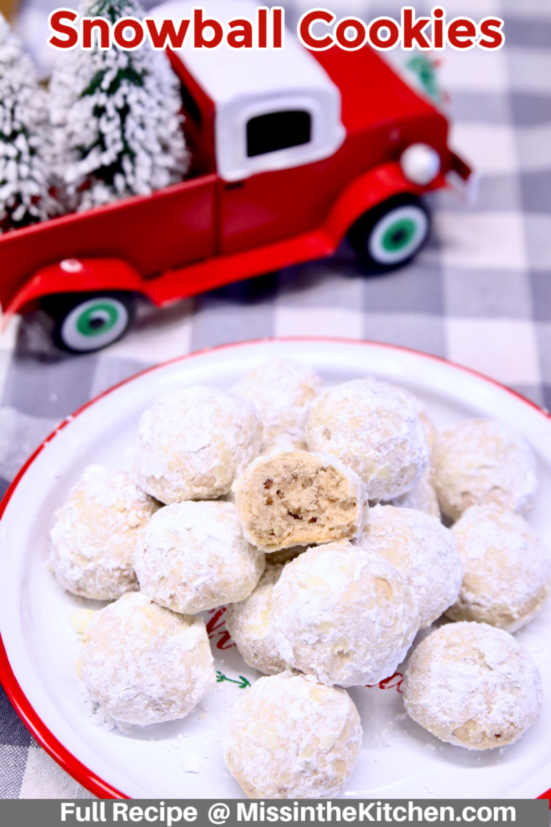 Snowball cookies on a platter, red Christmas truck in background