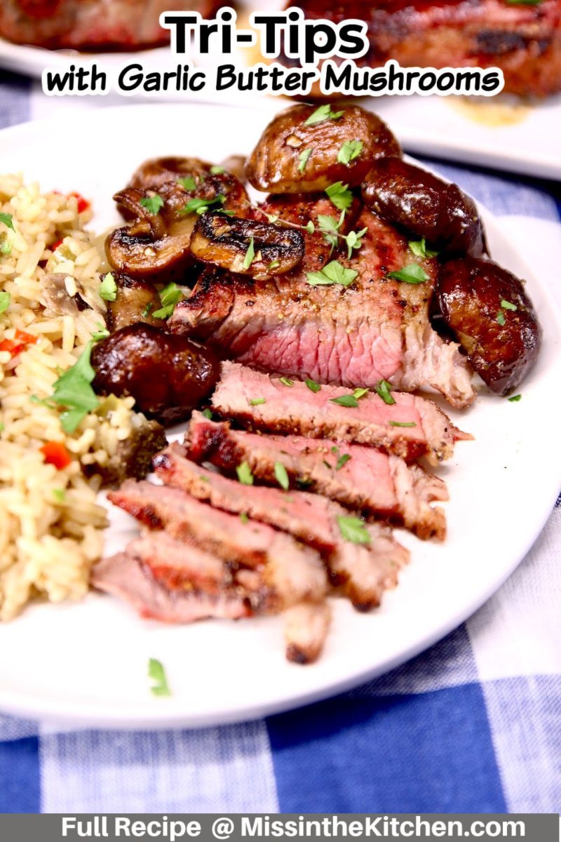 grilled trip tip steak on a plate with mushrooms and rice - text overlay