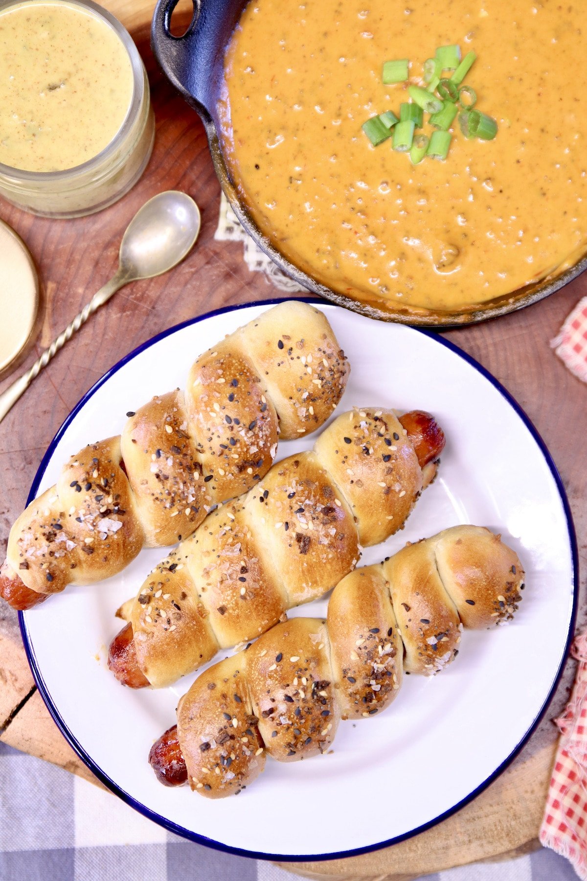 pretzel dogs with chili cheese dip and mustard