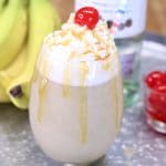 Banana Daiquiri with whipped cream, caramel drizzle and a cherry on top.