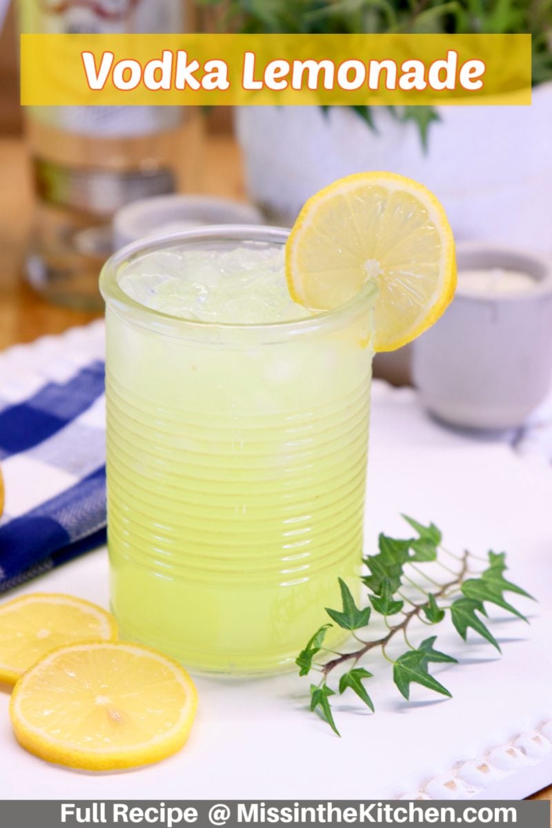 glass of lemonade with vodka and lemon garnish.
