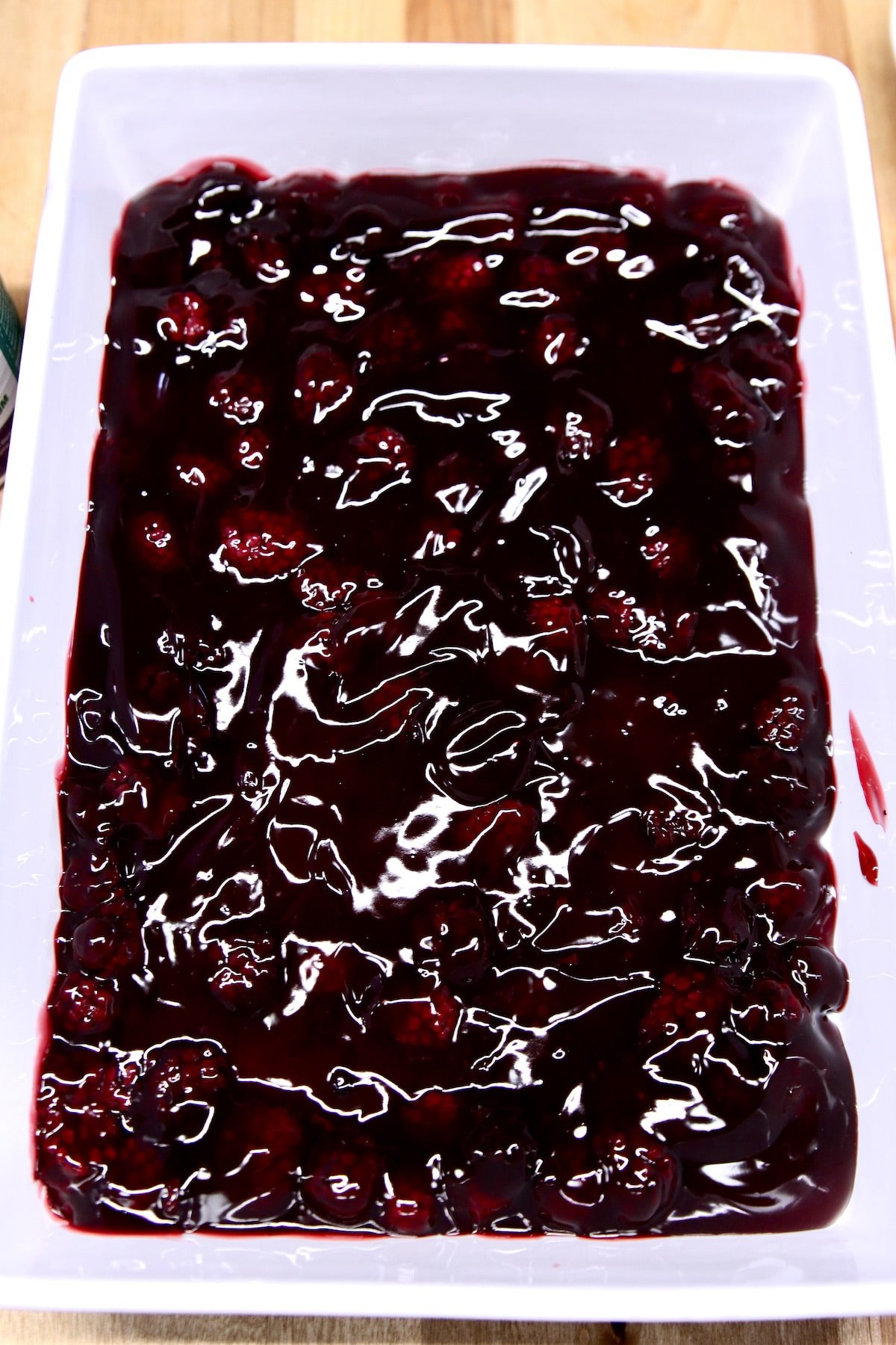 blackberry pie filling in a cake pan.