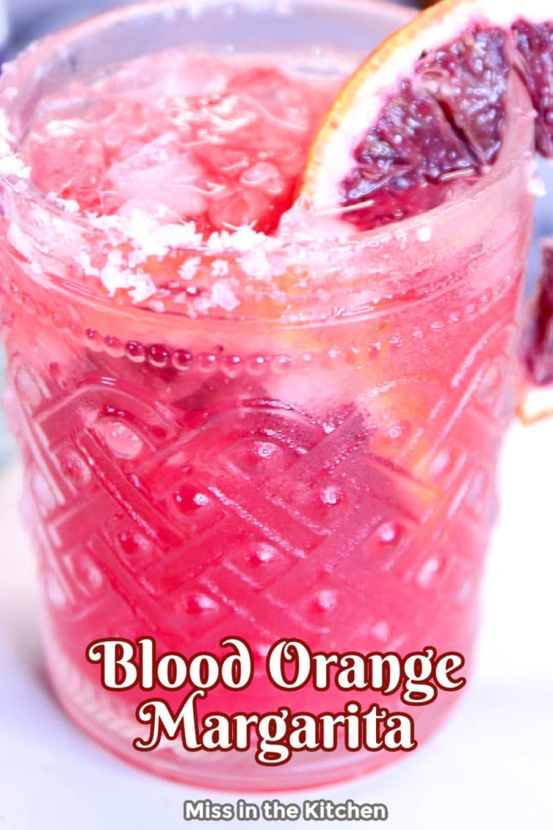 Blood Orange Margarita cocktail - closeup with text overlay.