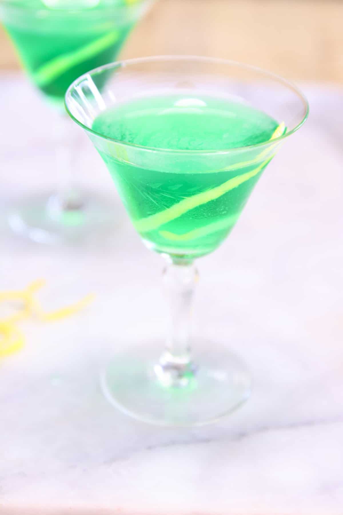 Irish Martini in a coupe glass with lemon twist.