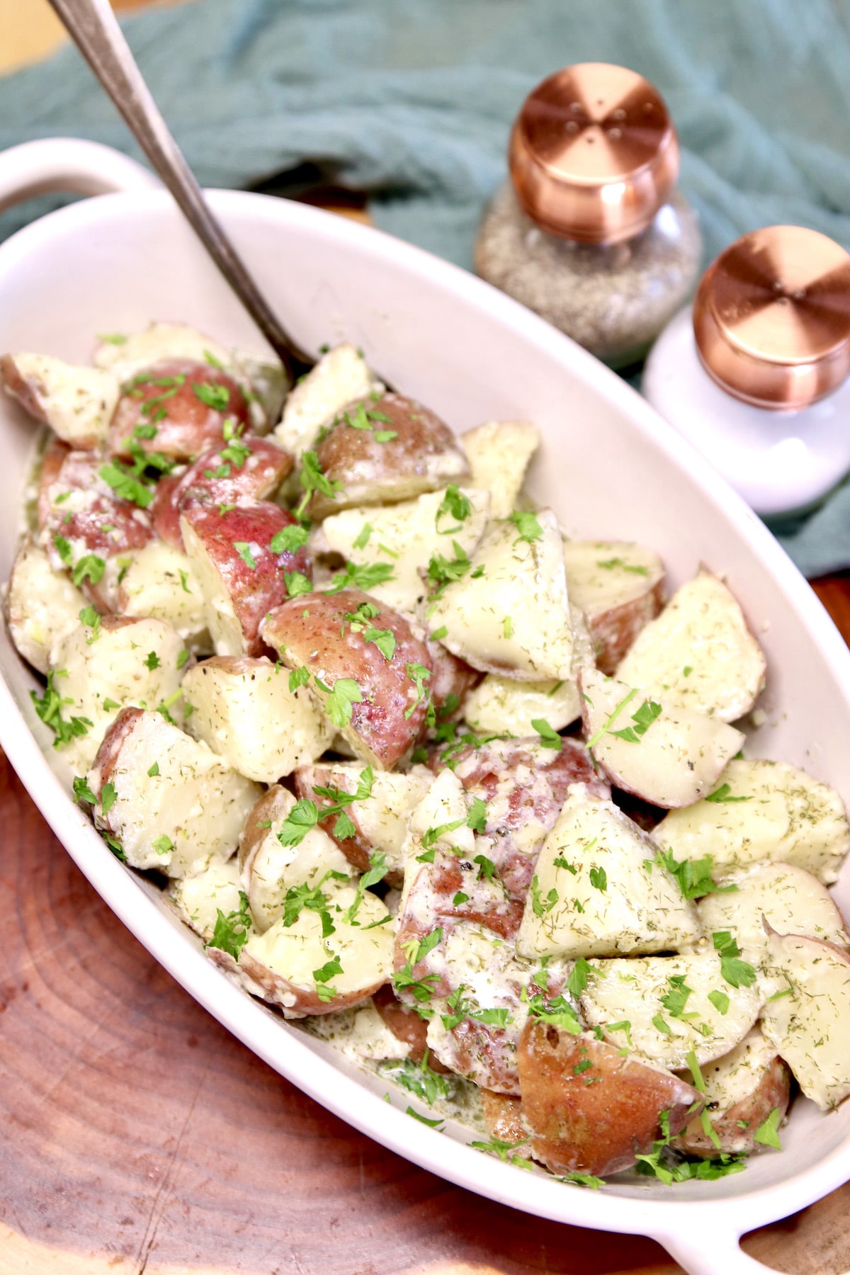 Dish of red potatoes with garlic and dill.