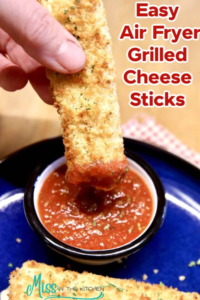 Grilled cheese stick dipping in marinara- text overlay.