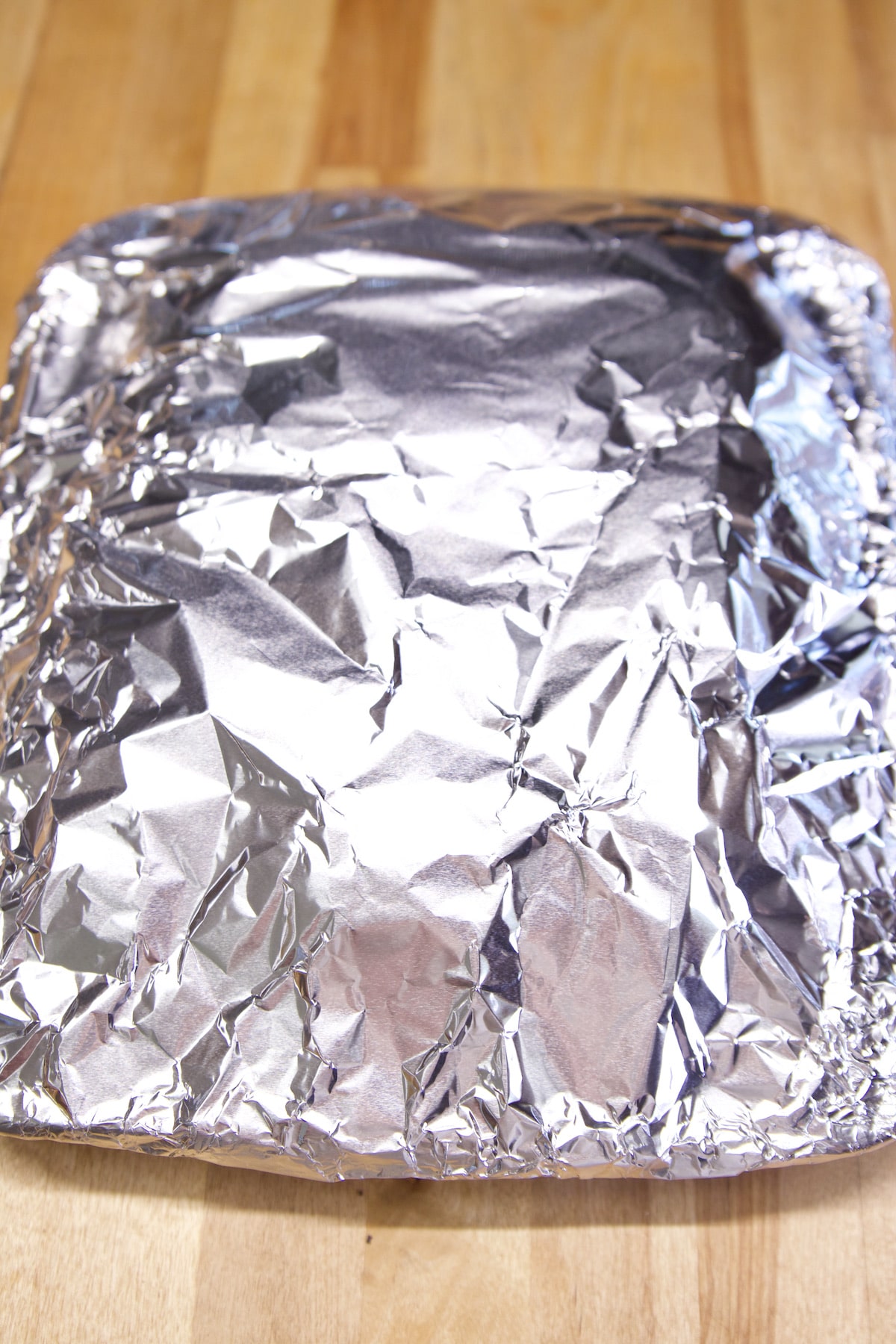 Foil covered pan of sliders.