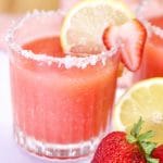 Strawberry Lemonade Margarita with lemon and strawberry garnish.