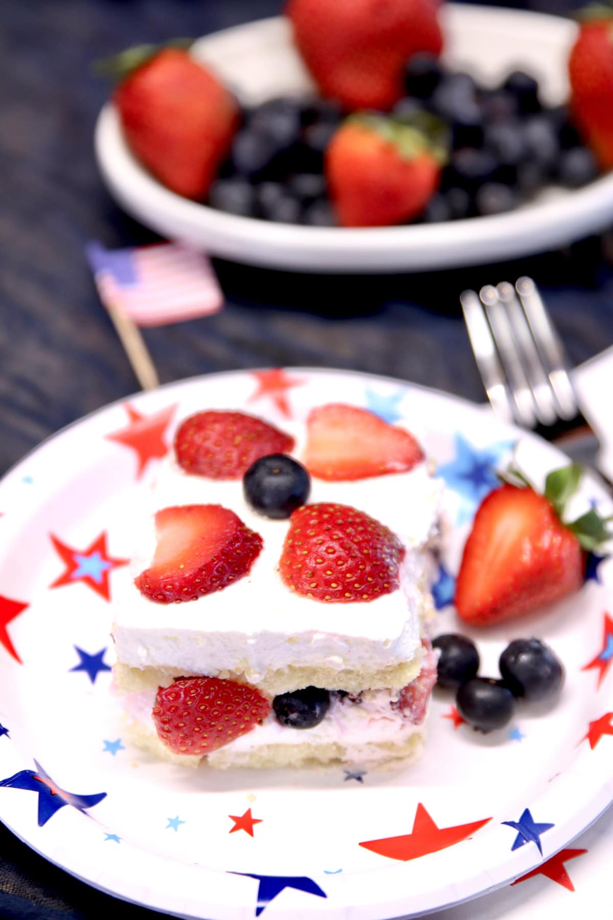 Berry Icebox Cake slice on a plate.