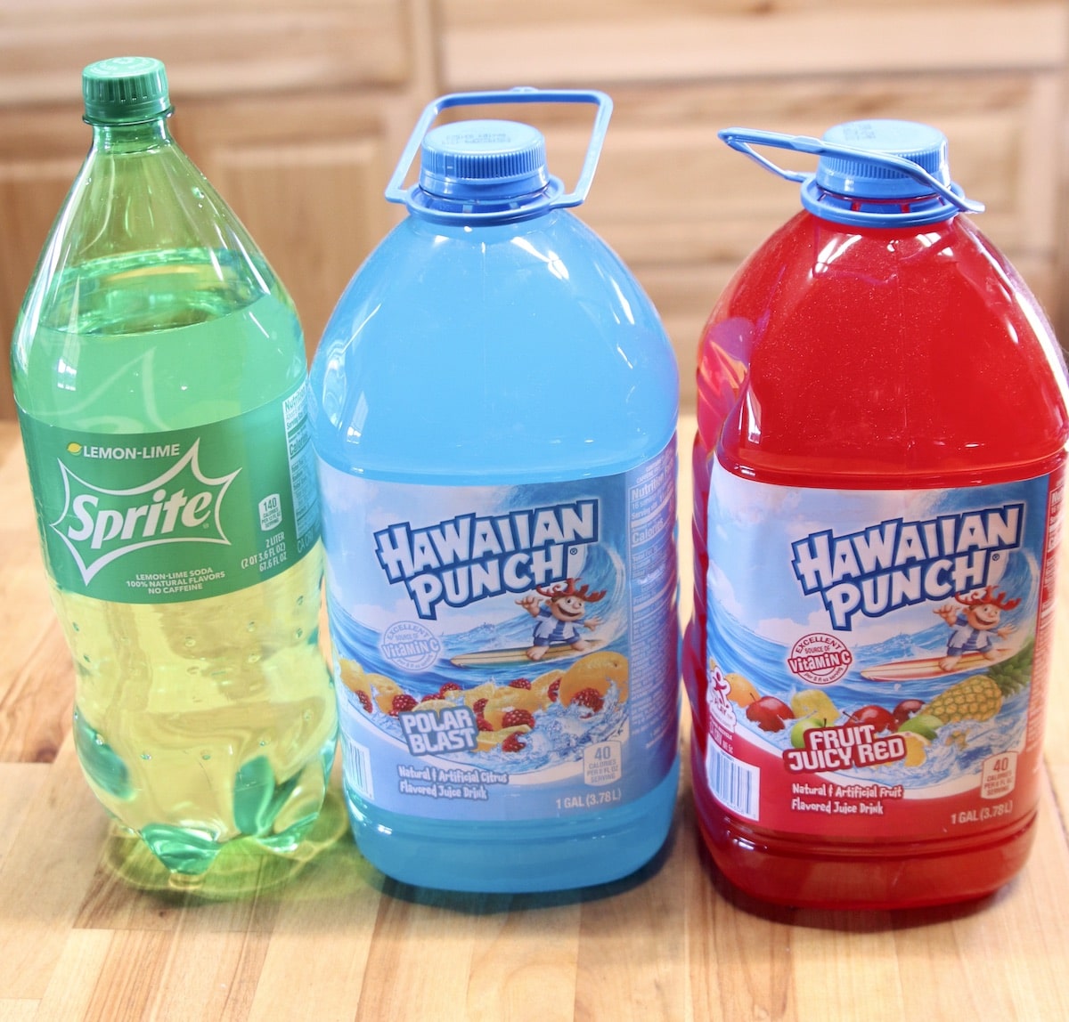 Sprite bottle with blue and red Hawaiian punch.