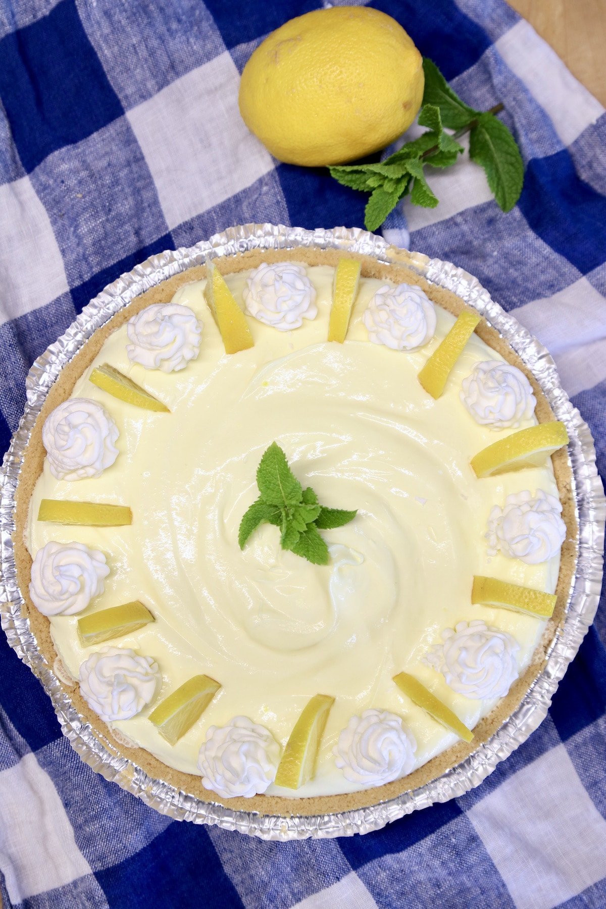 No Bake Lemon Pie with lemon and mint garnish.