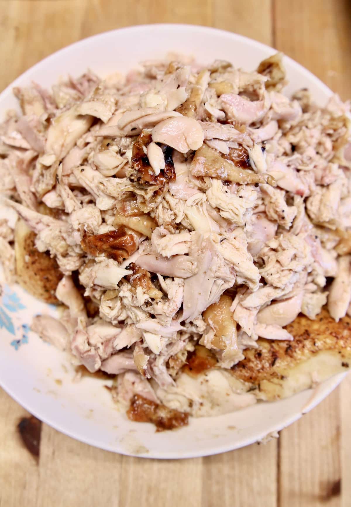Bowl of chopped chicken.