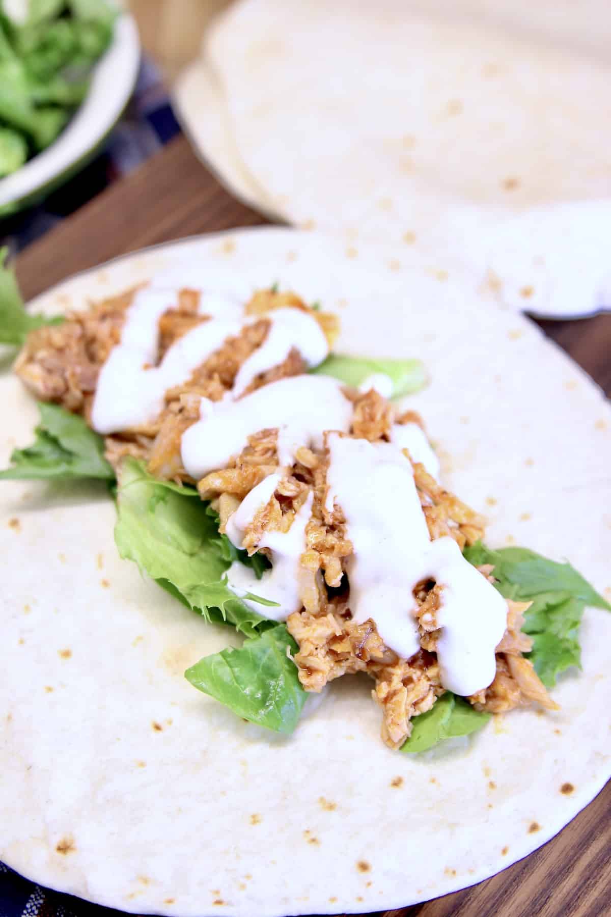 Chicken wrap with lettuce and ranch.