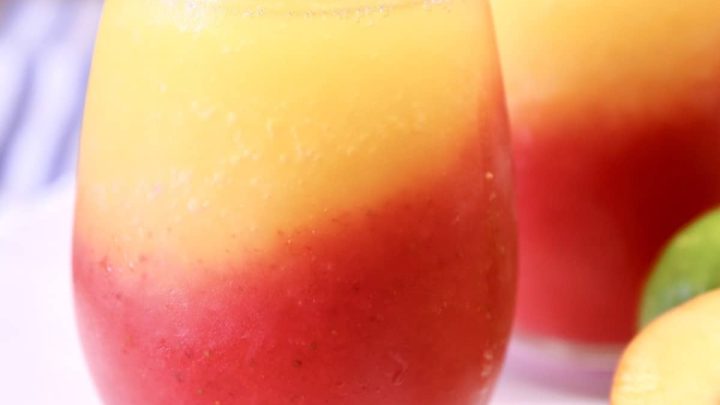 Strawberry Peach Daiquiri layered cocktails.