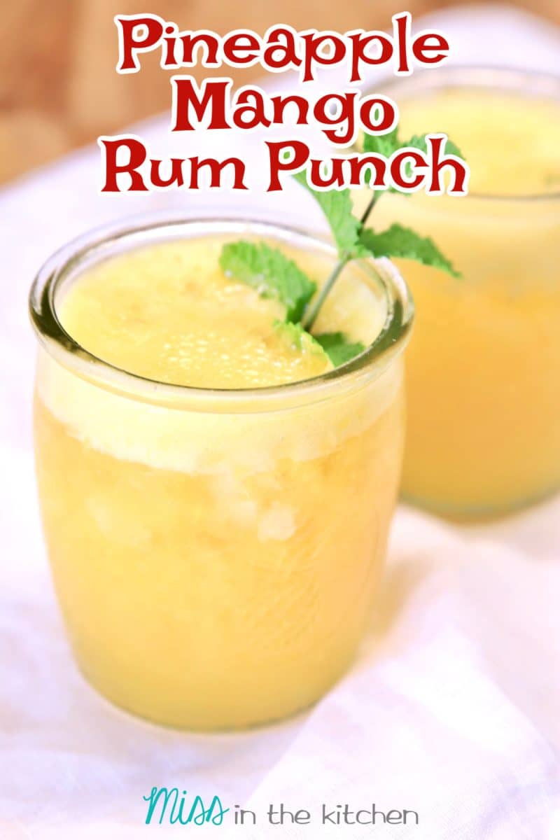 Pineapple Rum Punch in a glass with text overlay.
