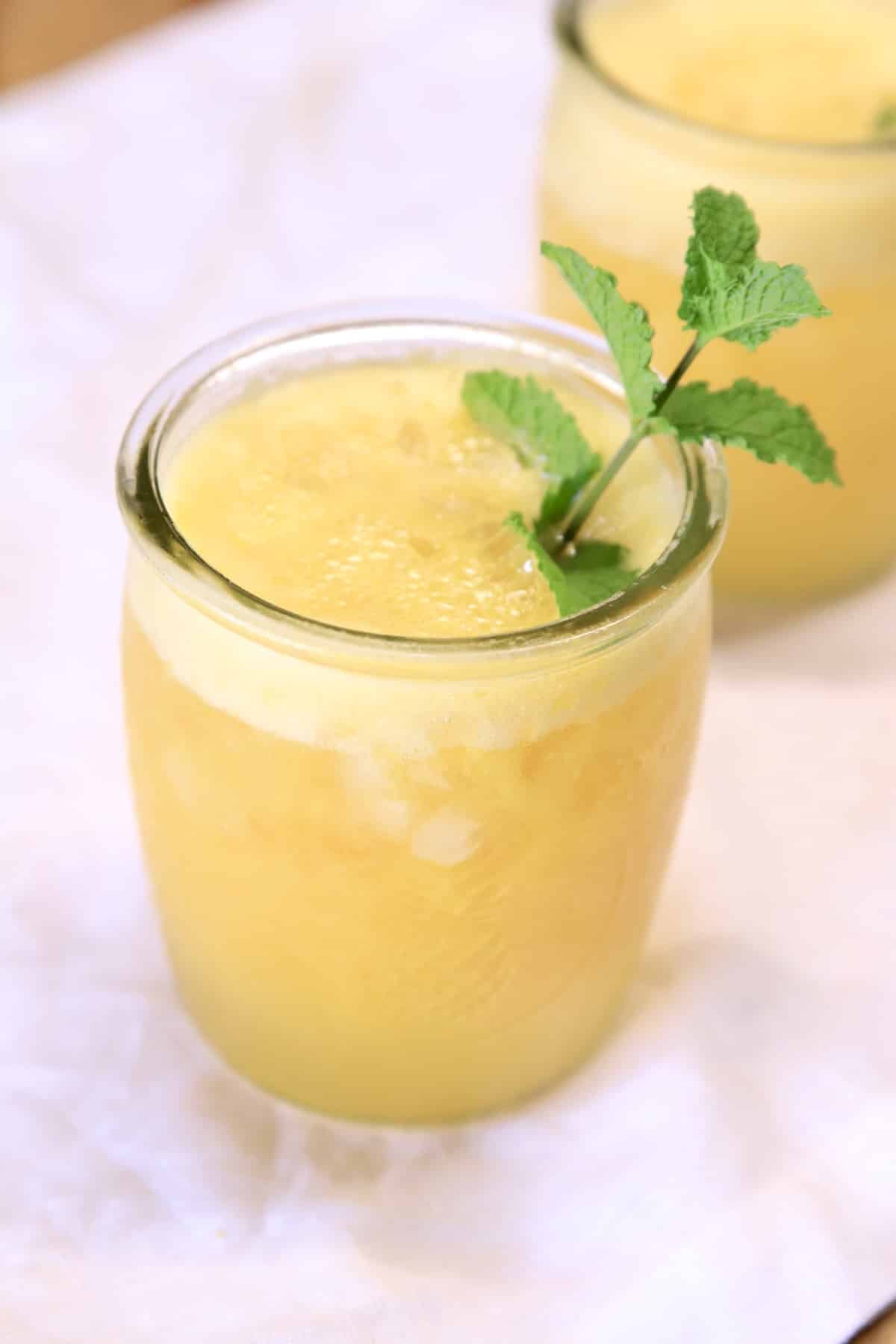 Pineapple cocktail with mint.
